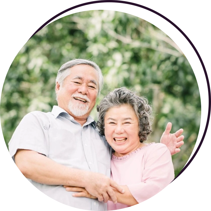 An older couple posing for a picture.